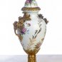 PORCELAIN HAND PAINTED URN WITH ANTIQUE ROSE SHAPED BRASS-BRONZE
