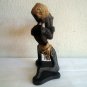 HANDMADE CARVED WOODEN OLD BALINESE ABORIGINAL MAN PLAYING SAXOPHONE FROM BALI