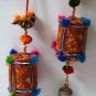 Colourful strings of hanging birds with Drum and bell.