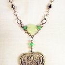 N10 - green and black beaded necklace with filigree heart pendant