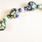 B8 - blue & green beaded bracelet
