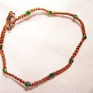 AB10 - green knotted bracelet