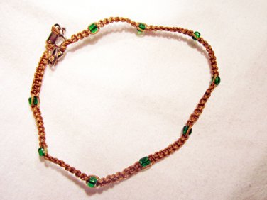 AB10 - green knotted bracelet