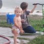 Model playing outSide in her fish diaper
