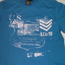 Blue short sleeve t shirt by Christian Audigier blue short sleeve tee shirt L XL