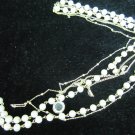 Imitation pearls with gold chain necklace