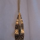 Gold Hammered Pendant on Long Gold Necklace