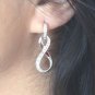 Ladies Rhodium Brass Earrings- Dangling Infinity
