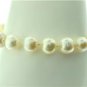VINTAGE LARGE PEARL BRACELET WITH 14 KT YELLOW GOLD CLASP.