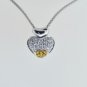 FINE 1.00 CT DIAMOND 18KT GOLD HEART PENDANT ON CHAIN.