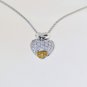 FINE 1.00 CT DIAMOND 18KT GOLD HEART PENDANT ON CHAIN.