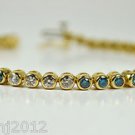 STUNNING 3.15 CT T.W DIAMOND TENNIS BRACELET IN 14 KT YELLOW GOLD
