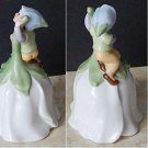 Avon 1983 Porcelain Flower Shaped Bell with Pixie Elf and Four Leaf Clovers