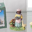Black Americana Figurine - Young Girl Holding Watering Can w/ Goose Young Inc