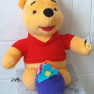 1998 Pooh Plush w/ flowers in pot & bee on hand by Mattel