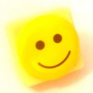 Pin Badge Smily Face Bright Yellow on Tile.  Mauritron #250489.