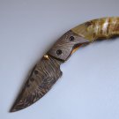 188 FO Damascus Folding Blade with RAM Horn & Damascus Bolsters and Leather Sheath