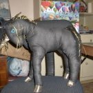 handcrafted stuffed  black and gold unicorn