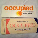 National Airlines Occupied Seat Placards