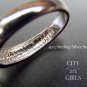 FLOWERBED STERLING SILVER WHITE AND MULTICOLORED CRYSTAL STUDDED FLOWERS RING