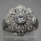 XAVIER ABSOLUTE STERLING SILVER WHITE CUBIC ZIRCONIA FLOWER RING