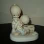Precious Moments Figurine 1980 "Love Lifted Me"