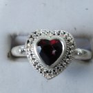 1012) Sterling Silver and Garnet Heart Ring SZ 9