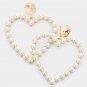 Gold Heart Shaped Cream Pearl Dangle Earrings