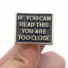 Gold "If You Can Read This You Are Too Close" Pin