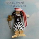 pirate girl Halloween costume with sword hair clip