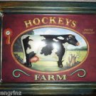 Advertising Tin Hockeys Farm with embossed cow image 9.5x7
