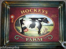 Advertising Tin Hockeys Farm with embossed cow image 9.5x7