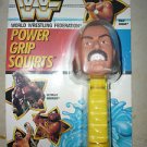 WWF Power Grip Squirts Jake the Snake Roberts Squirt Gun 1990 action figure