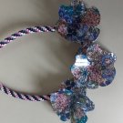Kumihimo braid with flowered acrylic flowers