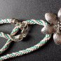 kumihimo braid with metal flower