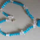 Bright blue and clear bead necklace