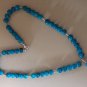 Blue bead necklace with heart pendant