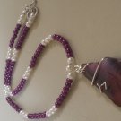 Wire wrapped unusual shaped agate on bead necklace