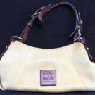 Dooney and Bourke Pebbled Leather Hobo Handbag in Cream Yellow