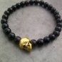 Gold Skull Black Beaded Bracelet