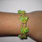 Purple, Green and Yellow Rubber Band Bracelet