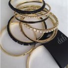 Stylish Multi Bracelet Bangle Set 9 pcs  Black and Gold tones Jewelery from  deb