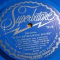 JANE GREEN- WILD ROMANTIC BLUES- BLUE WAX-SUPERBATONE