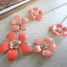 Flower statement necklace with coral enamel
