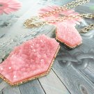 Gold metal geometric long pendant necklace with pink faux drucy stones