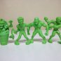 Slug Zombies Lot of 4 mini figures green pvc Muscle Men scary little ugly guys Jakks Pacific 2012