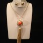Orange marble wrapped in rhinestone on 12" chain