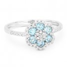 0.63 ct Round Cut Blue Topaz & Diamond Right-Hand Flower Ring in 14k White Gold 0.63 ct Round Cut Blue Topaz & Diamond Right-Hand Flower Ring in 14k White Gold
