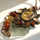 Empress of Autumn Prehnite Paua Garnet Wire wrapped Pendant Necklace