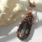 Ink Seas--Ancient Orthoceras fossil pendant wrapped in copper